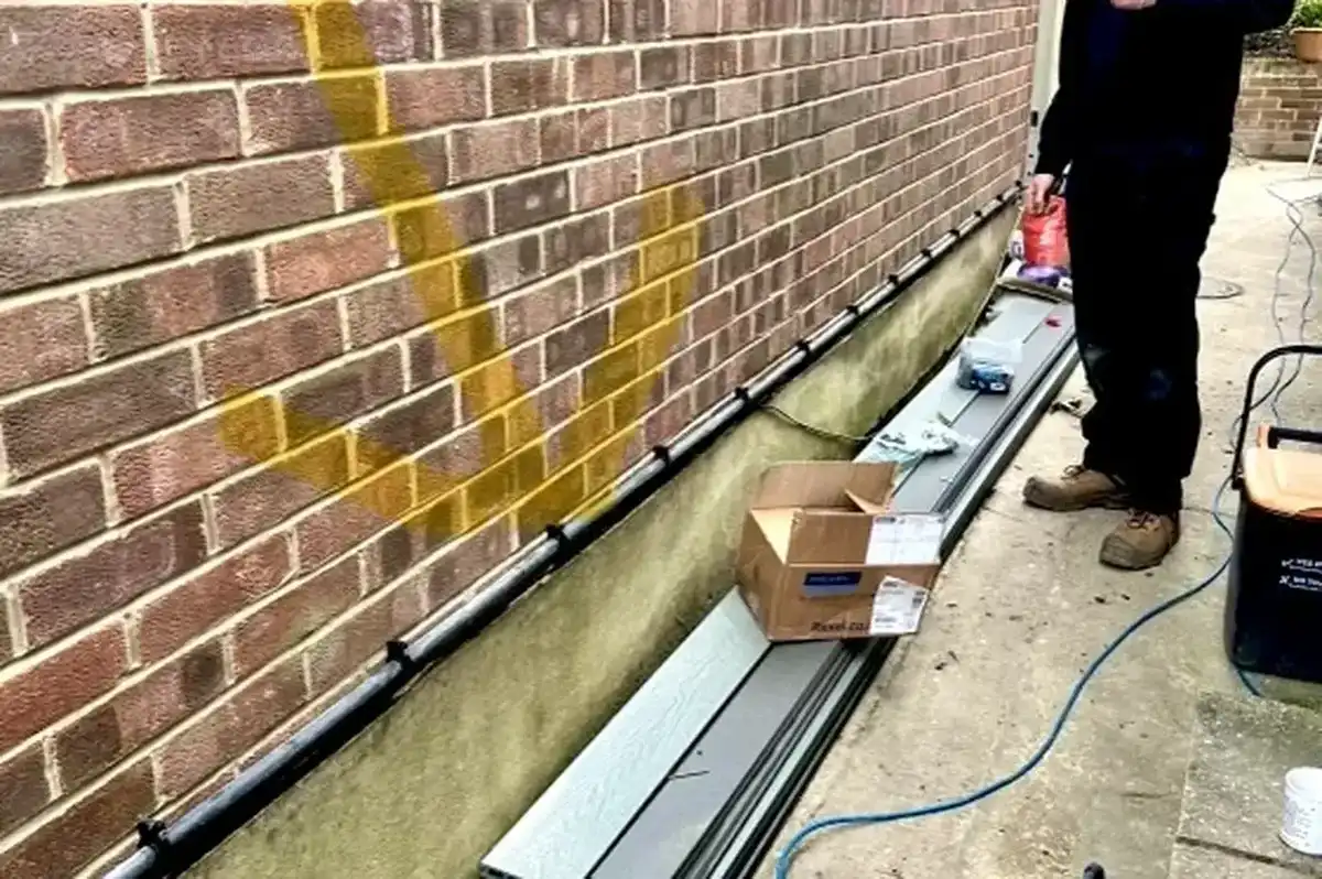 External conduit run installed Collier Row Romford — garden power