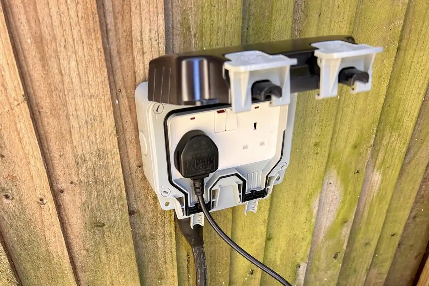 Weatherproof garden socket installed Rise Park Romford — outdoor power